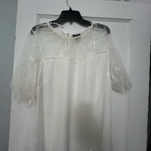 White City Chic blouse. Nice for work and can dress it up with a pair of jeans.